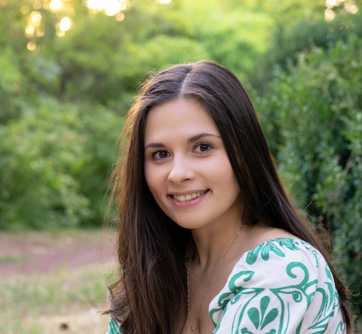 Marina Vinokhodova outdoors in a green garden